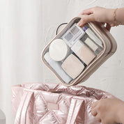 Borsa organizer trasparente per cosmetici, compatta e portatile, ideale per viaggi. Design elegante, facile accesso ai trucchi essenziali.