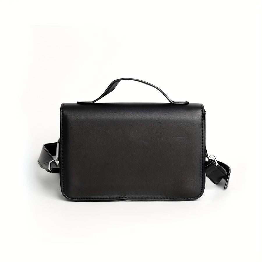 Borsa a tracolla in pelle nera, design elegante e minimalista, con manico superiore e tracolla regolabile. Accessorio moda unisex.