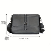 Borsa a tracolla in pelle nera, dimensioni 35x27x10 cm, con cinturino regolabile e fibbia frontale. Elegante e pratica per uso quotidiano.