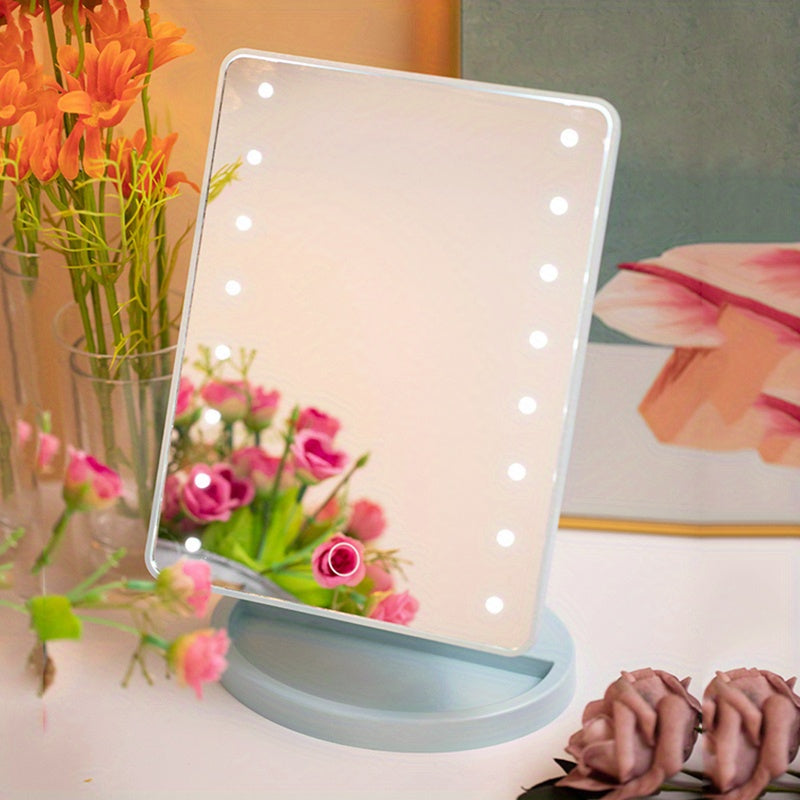 Specchio cosmetico LED rettangolare con cornice bianca, circondato da fiori rosa e arancioni. Ideale per trucco, illuminazione regolabile.