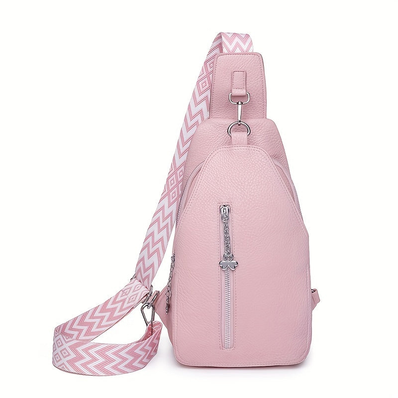 Zaino monospalla rosa in pelle con tracolla regolabile a motivo geometrico, tasca frontale con zip, design elegante e moderno per donna.