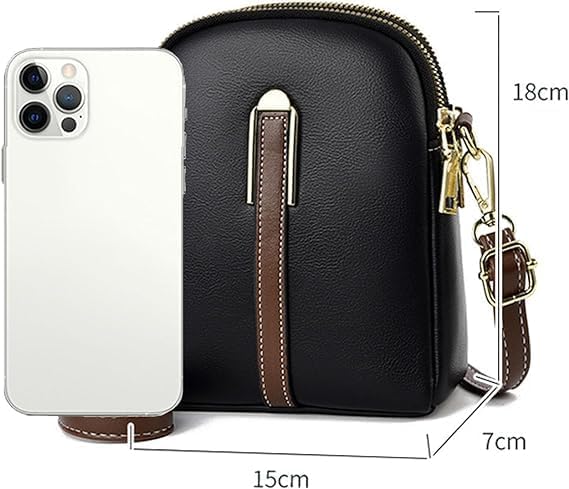 Borsa a tracolla nera in pelle PU con dettagli marroni, dimensioni 18x15x7 cm, accanto a uno smartphone bianco. Accessorio moda elegante e compatto.