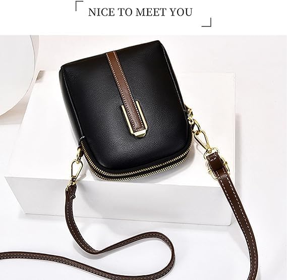 Borsa a tracolla nera in pelle con cerniera dorata e cinturino marrone, design elegante e compatto, ideale per moda femminile e accessori.