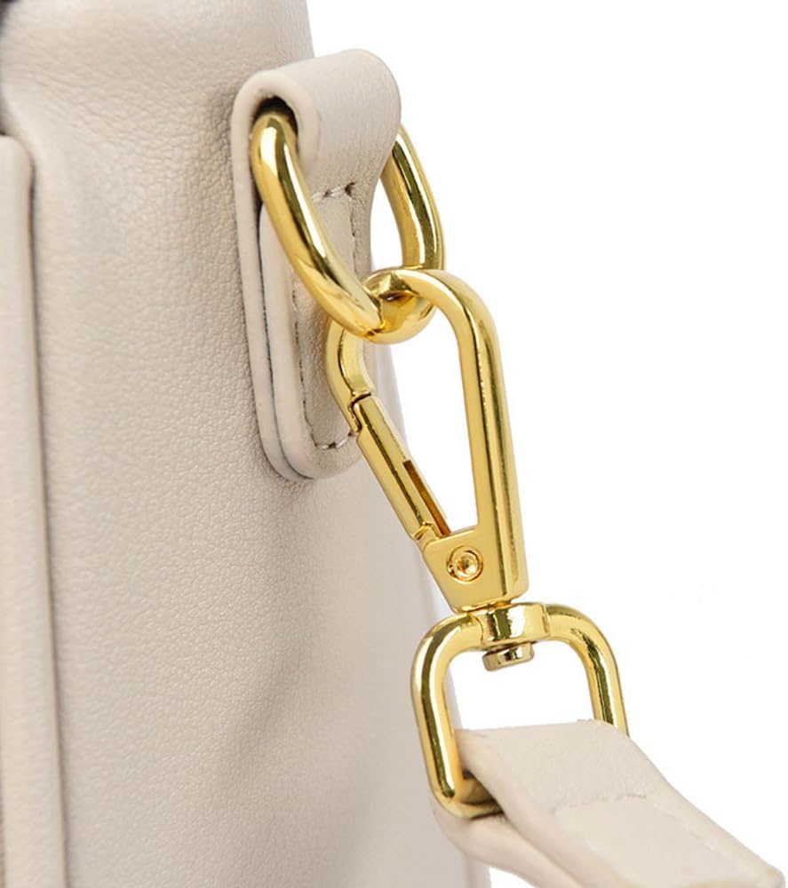 Gancio dorato su borsa in pelle beige, dettaglio elegante e moderno. Accessorio moda donna, alta qualità, stile sofisticato.