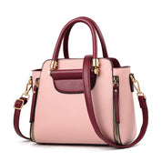 Borsa a mano elegante in pelle rosa e bordeaux con dettagli dorati, tracolla regolabile, design moderno, ideale per moda femminile.