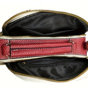 Borsa a tracolla in pelle rossa e bianca con cerniera aperta, design elegante, scomparti multipli, accessorio moda donna.