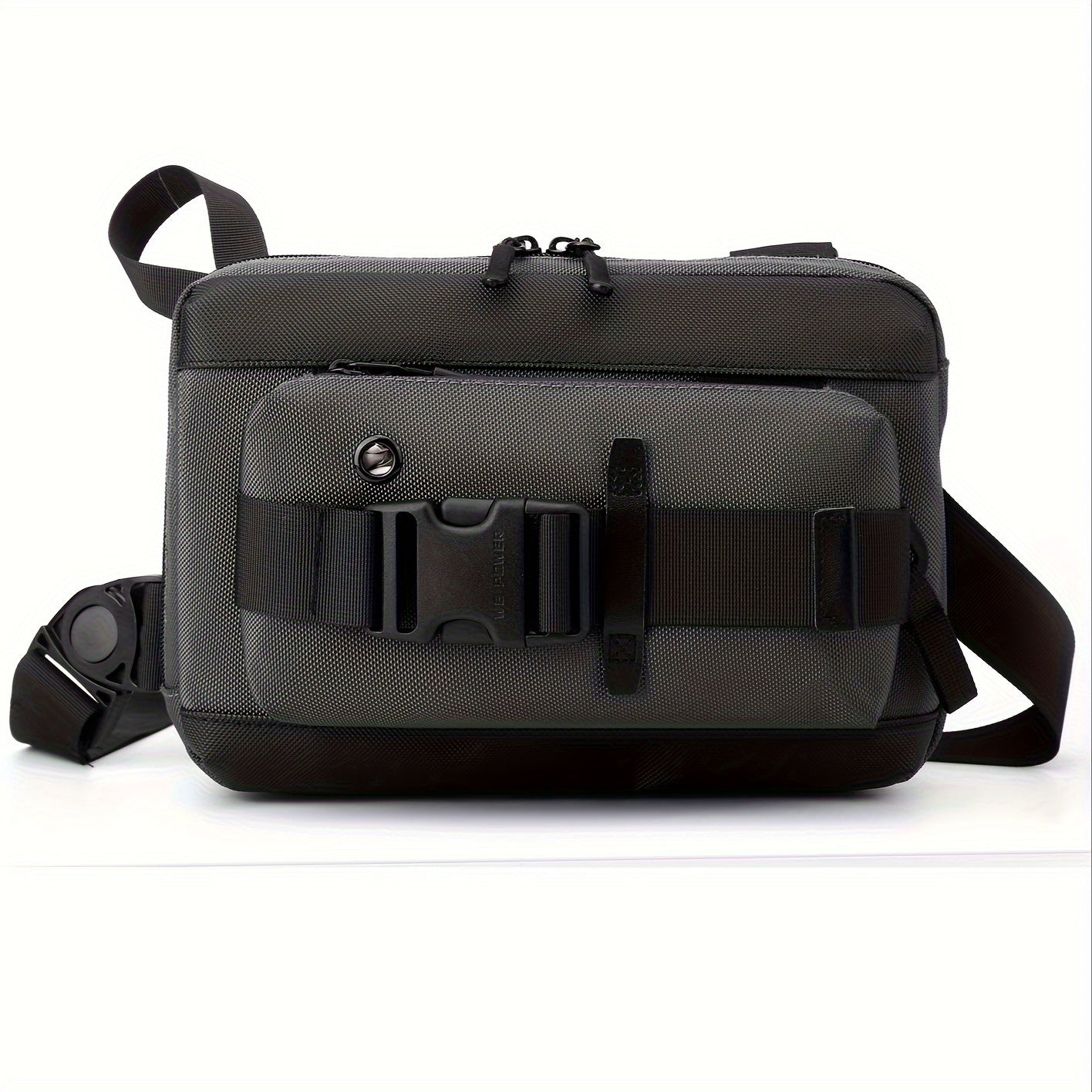 Borsa a tracolla nera unisex, design moderno, con tasca frontale e cerniere, ideale per viaggi e uso quotidiano. Accessorio moda versatile.