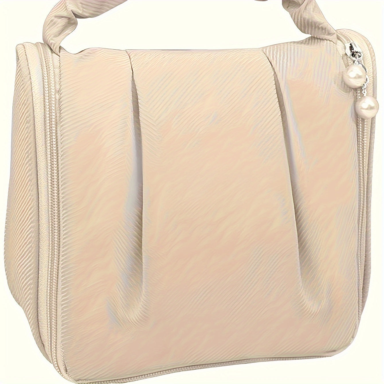 Borsa cosmetica beige elegante con chiusura a zip e decorazione di perle, ideale per viaggi e organizzazione trucco. Accessorio moda donna.
