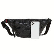 Marsupio nero trapuntato con smartphone bianco, design elegante e moderno, ideale per moda urbana e praticità quotidiana. Accessorio unisex.