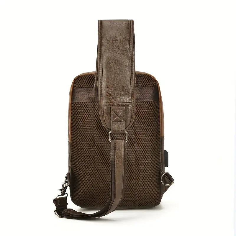 Zaino monospalla in pelle marrone, design elegante e moderno, ideale per uomo, con tracolla regolabile e tasche multiple. Perfetto per viaggi e lavoro.