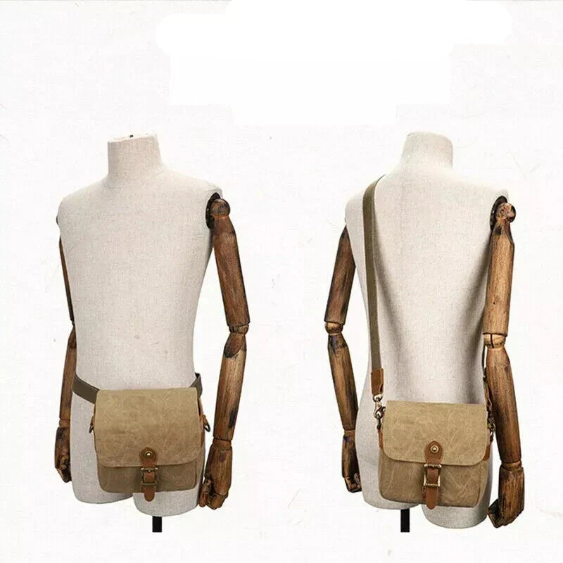 Borsa a tracolla in tela beige su manichino, design vintage, chiusura a fibbia, ideale per uomo e donna, moda casual, accessorio unisex.