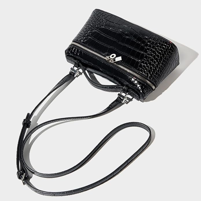 Borsa a tracolla nera in pelle effetto coccodrillo, design elegante con zip argentata, ideale per moda donna. Accessorio chic e versatile.