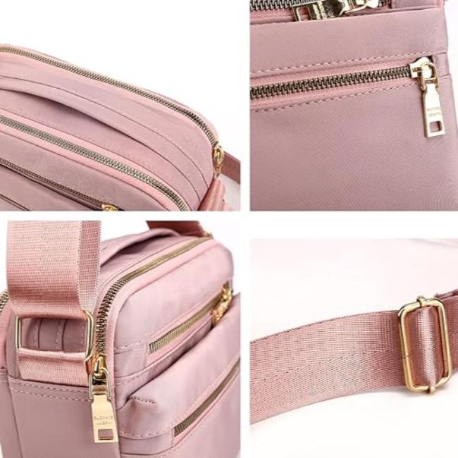 Borsa a tracolla rosa in tessuto con cerniere dorate, tasche multiple e cinturino regolabile. Elegante e pratica per l'uso quotidiano.