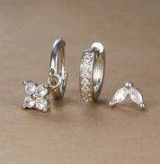 Orecchini in argento con zirconi, design a cerchio e pendente a forma di fiore, eleganti e brillanti, ideali per occasioni speciali.
