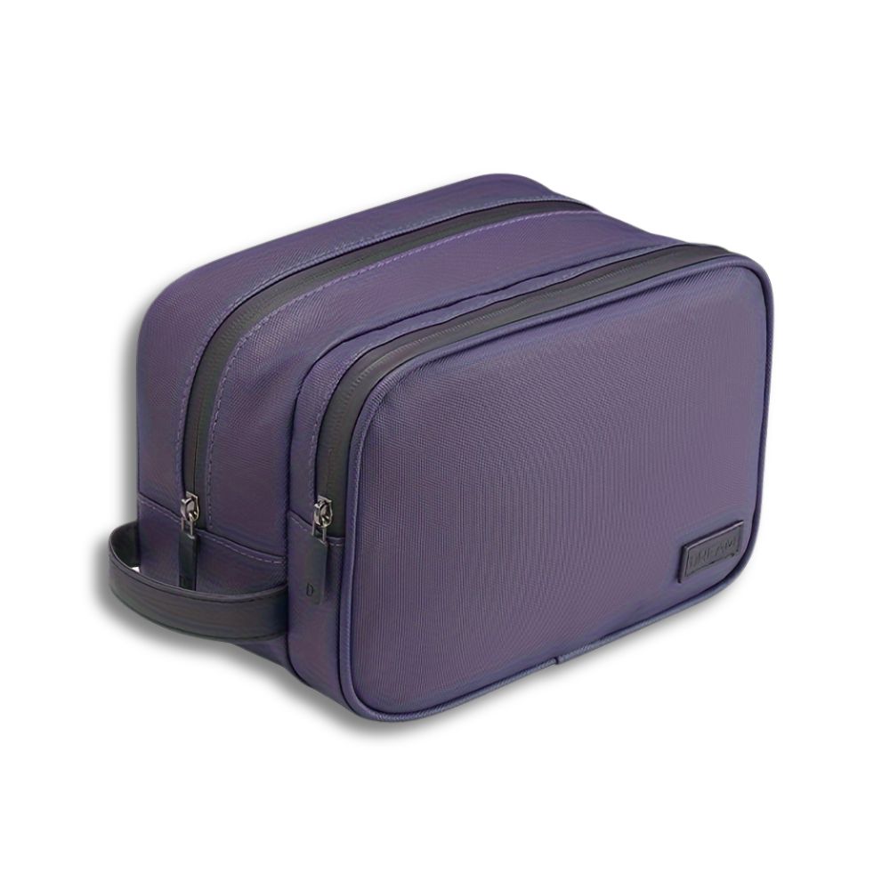 Astuccio da viaggio viola con doppia cerniera, design elegante e compatto, ideale per organizzare accessori e articoli da toeletta.