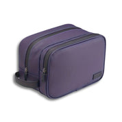 Astuccio da viaggio viola con doppia cerniera, design elegante e compatto, ideale per organizzare accessori e articoli da toeletta.