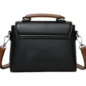 Borsa a tracolla in pelle nera con manico marrone, design elegante e moderno, ideale per donna, accessorio moda versatile e chic.