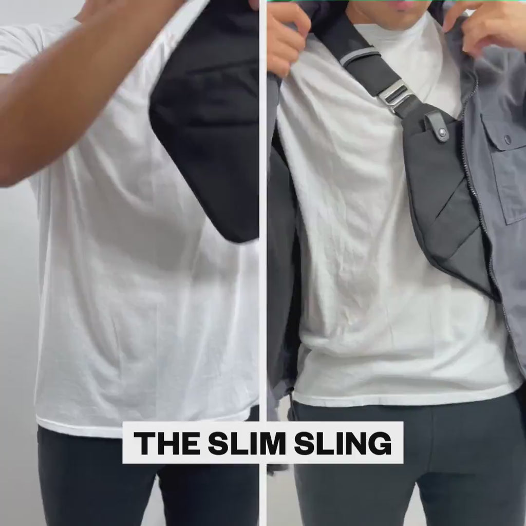 Borsa a tracolla slim nera indossata da uomo con t-shirt bianca e giacca grigia. Design moderno, ideale per accessori quotidiani.