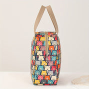 Borsa termica colorata con stampa orsetti, manici beige, chiusura a zip, ideale per picnic e pranzo al sacco. Design vivace e funzionale.