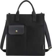 Borsa tote nera in tela con tasca frontale, manici e tracolla regolabile. Design elegante e funzionale, ideale per uso quotidiano e lavoro.