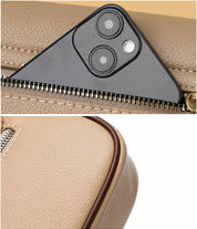 Borsa in pelle beige con cerniera, dettaglio fotocamera smartphone. Design elegante, accessorio moda donna, alta qualità.