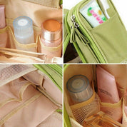 Borsa organizer da viaggio verde con scomparti per cosmetici, flaconi e accessori. Ideale per organizzare trucchi e prodotti da bagno.