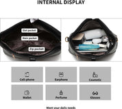 Interno borsa donna nera con tasche: slot, principale, zip. Contiene cellulare, auricolari, cosmetici, portafoglio, profumo, occhiali.
