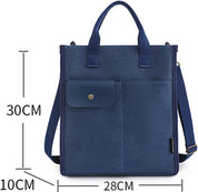 Borsa a tracolla blu in tela, dimensioni 30x28x10 cm, con tasca frontale e manici. Design elegante e pratico per uso quotidiano.
