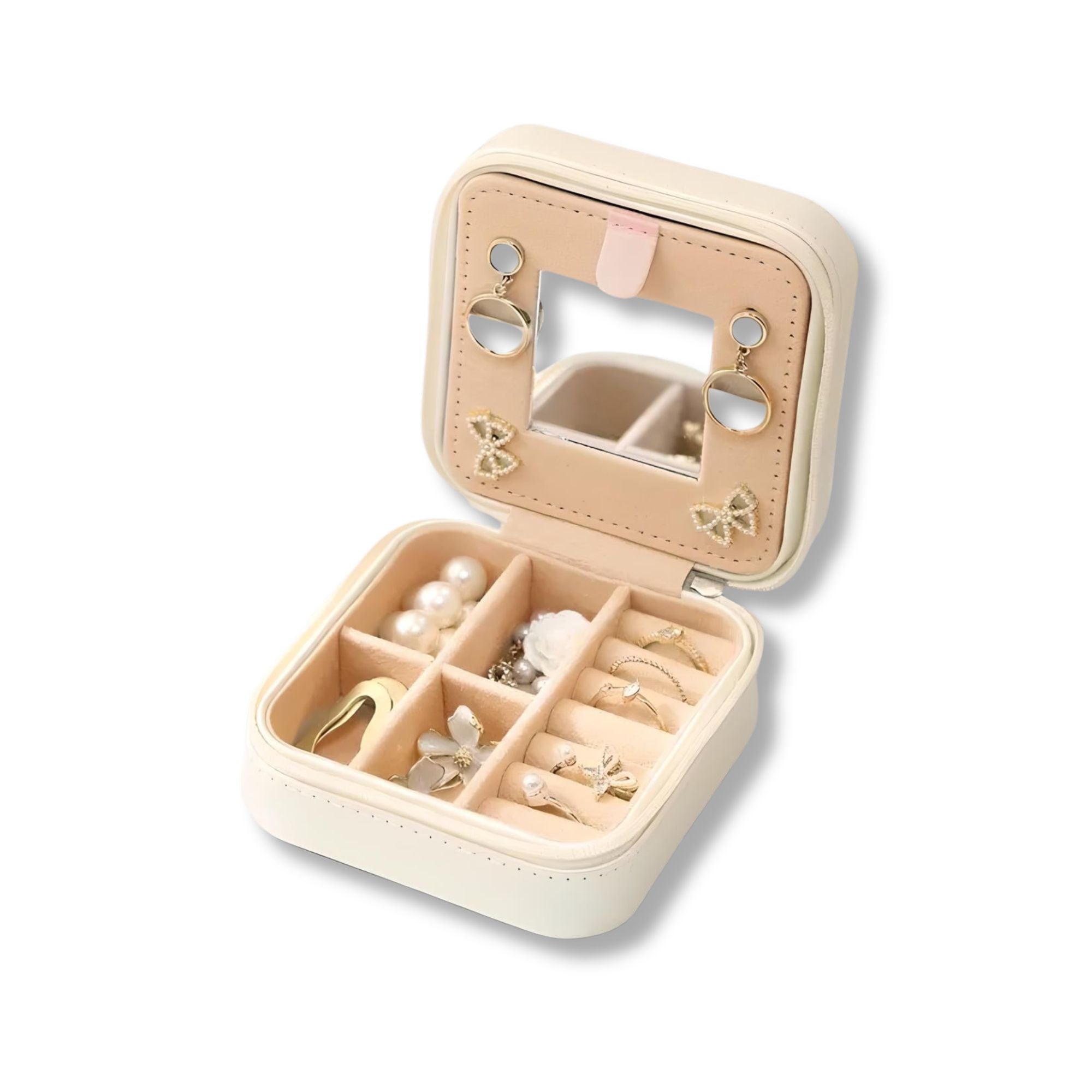 Scatola portagioie da viaggio in pelle beige con specchio, scomparti per anelli, orecchini e collane. Design compatto e elegante.