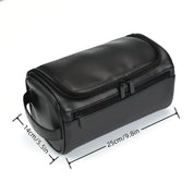Borsa da toilette in pelle nera, dimensioni 25x14 cm, con doppia cerniera e manico laterale. Elegante e pratica per viaggi e organizzazione.