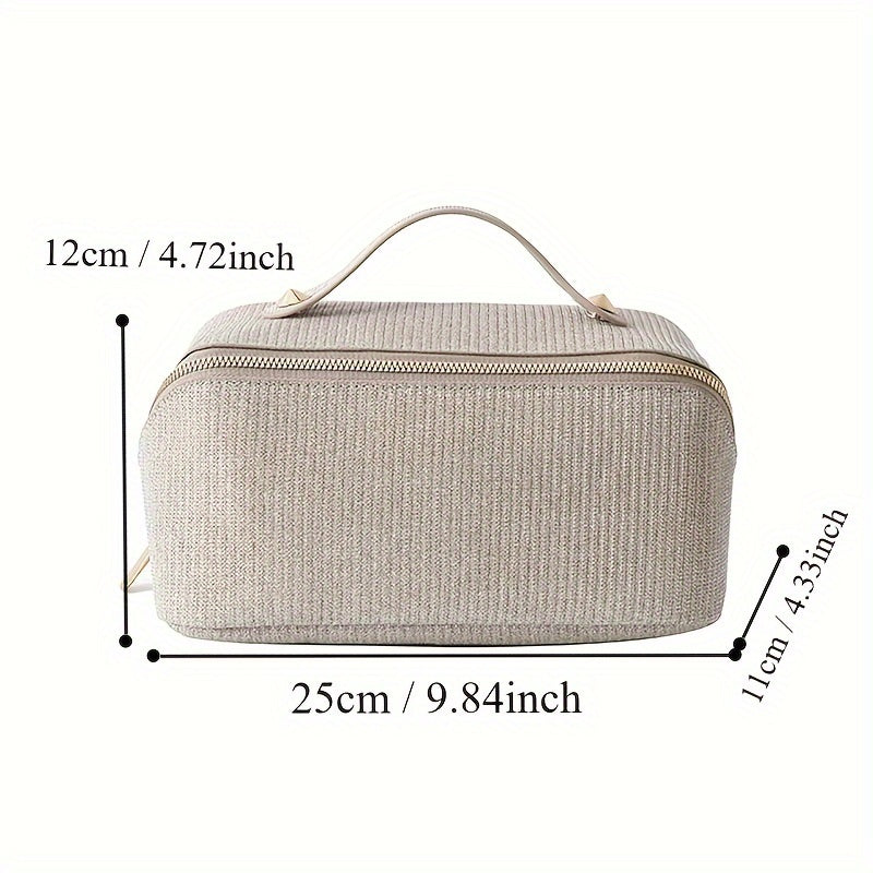 Borsa da toilette beige in tessuto, dimensioni 25x12x11 cm, con manico e cerniera dorata. Ideale per viaggi, organizer cosmetici.