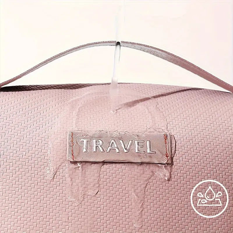 Borsa da viaggio rosa impermeabile con etichetta "TRAVEL", design elegante, resistente all'acqua, ideale per viaggi e organizzazione bagagli.