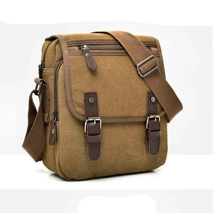 Borsa a tracolla in tela marrone con fibbie in pelle, tasca frontale con zip, design vintage, ideale per uomo e donna, perfetta per uso quotidiano.