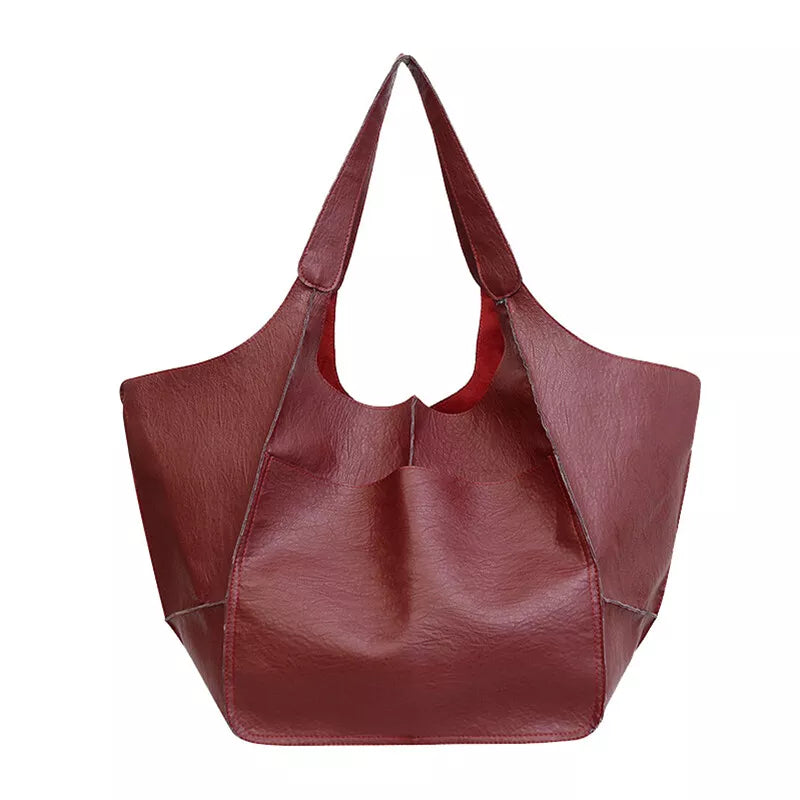 Borsa a spalla in pelle marrone, design elegante e spazioso, ideale per moda donna. Accessorio versatile per ogni occasione.