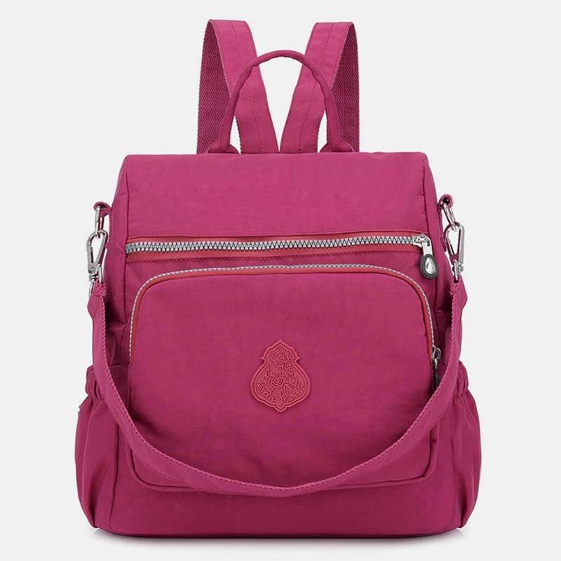 Zaino donna rosa, multifunzione, con tasche frontali e laterali, chiusura zip, spallacci regolabili. Ideale per scuola, lavoro, viaggio.