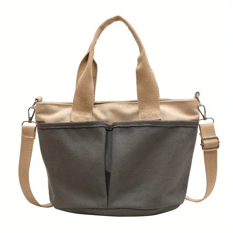 Borsa a tracolla in tela grigia e beige con manici e cinghia regolabile. Design casual, ideale per uso quotidiano e shopping.