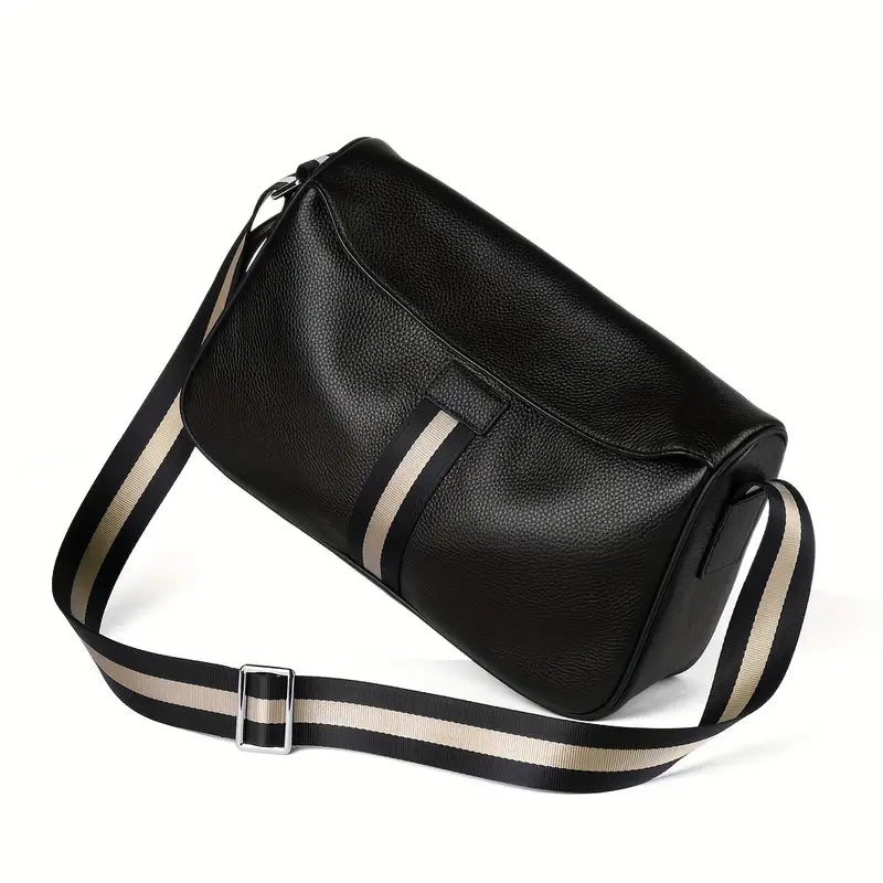 Borsa a tracolla in pelle nera con cinturino regolabile a righe bianche e nere, design elegante e moderno, ideale per uomo e donna.