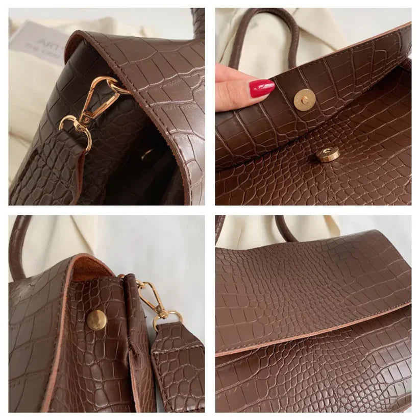 Borsa a tracolla in pelle marrone con texture coccodrillo, chiusura a bottone magnetico, dettagli in metallo dorato. Elegante e alla moda.