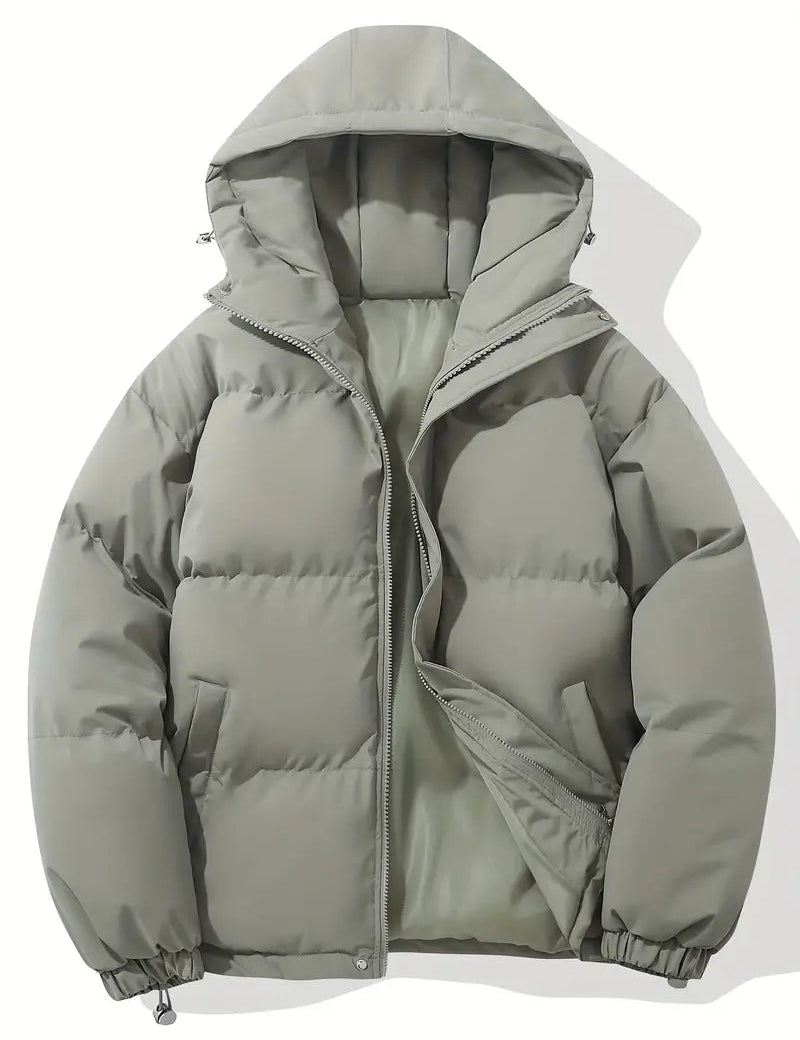 Giacca invernale imbottita grigia con cappuccio, chiusura a zip, design trapuntato. Ideale per uomo, moda casual, abbigliamento caldo.