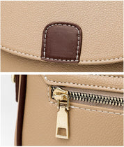 Borsa in pelle beige con dettagli marroni, chiusura a zip dorata. Design elegante e moderno, ideale per moda femminile e accessori di lusso.