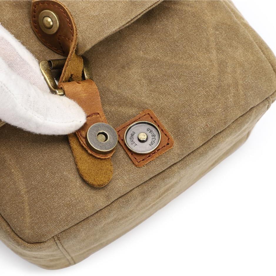Borsa a tracolla in tela marrone con chiusura magnetica in pelle, dettaglio di fibbia in metallo. Design vintage, resistente e alla moda.