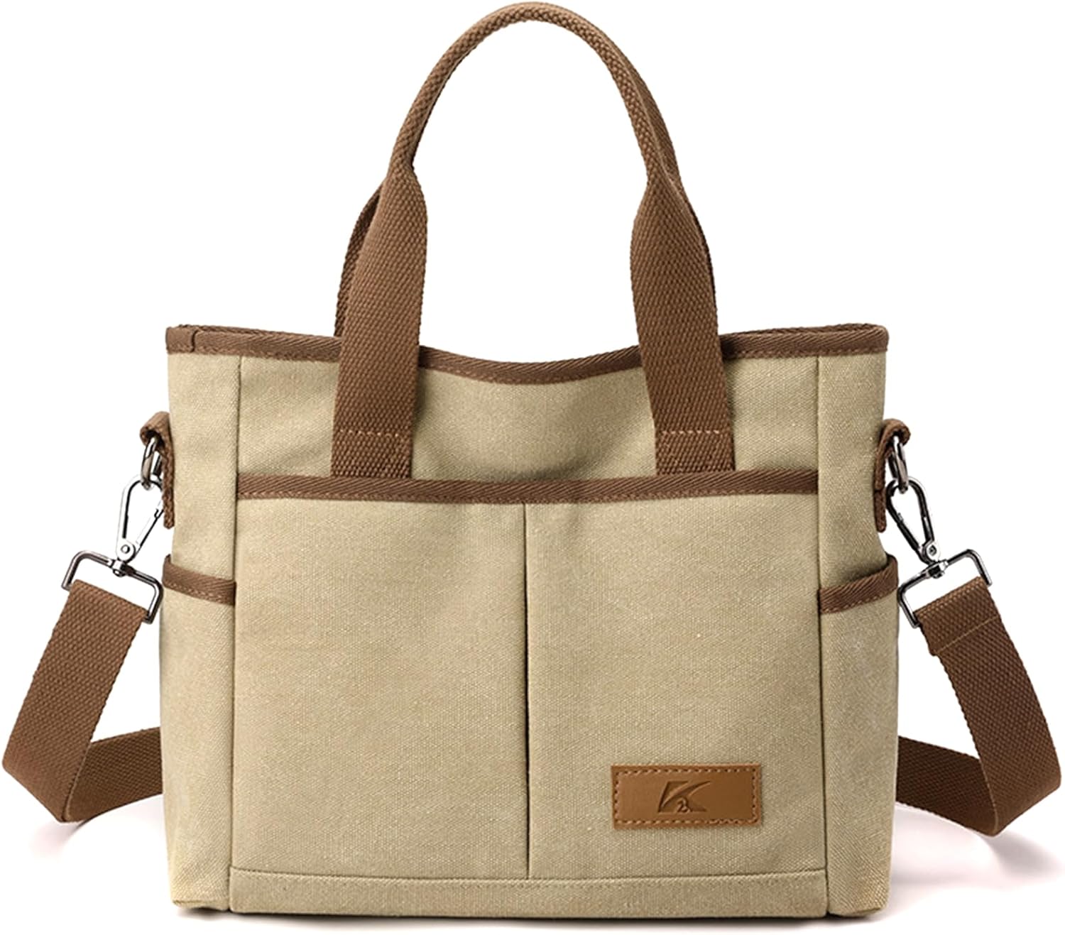 Borsa a tracolla in tela beige con manici marroni, tasche frontali e tracolla regolabile. Design casual, ideale per uso quotidiano e shopping.