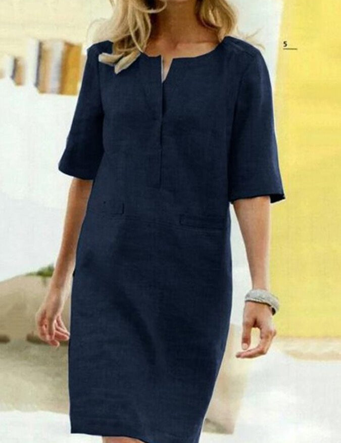 Abito donna blu scuro, maniche corte, scollo a V, stile casual elegante. Perfetto per occasioni estive e look quotidiani.
