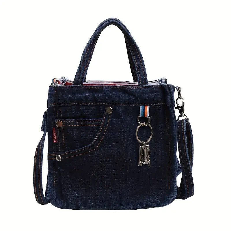 Borsa a tracolla in denim blu scuro con manici, tasca frontale e portachiavi. Design casual, ideale per moda quotidiana e shopping.