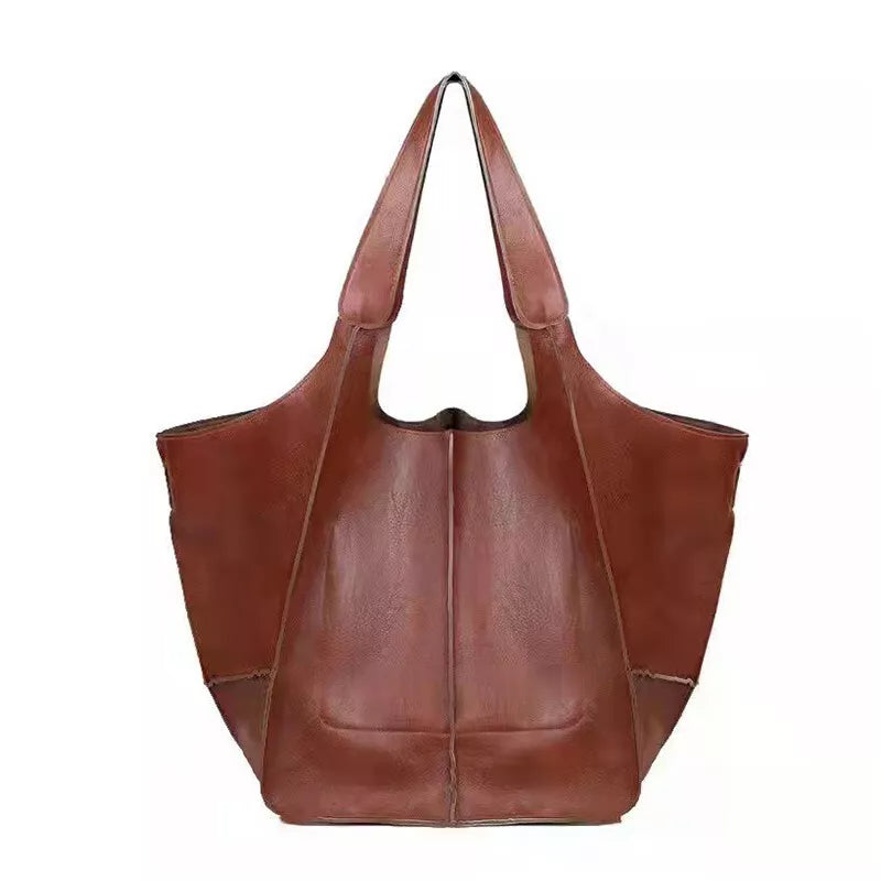 Borsa a spalla in pelle marrone, design elegante e spazioso, ideale per moda donna, accessorio versatile per ogni occasione.