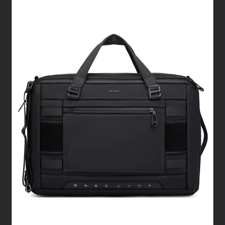 Borsa da lavoro nera in nylon, resistente all'acqua, con manici e tracolla regolabile. Design moderno, tasca frontale con zip. Perfetta per laptop.