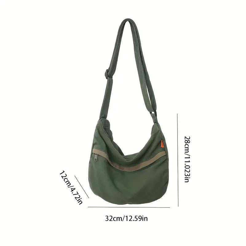 Borsa a tracolla verde oliva, dimensioni 32x12x28 cm, design casual, tasca frontale con zip, ideale per uso quotidiano e viaggi.