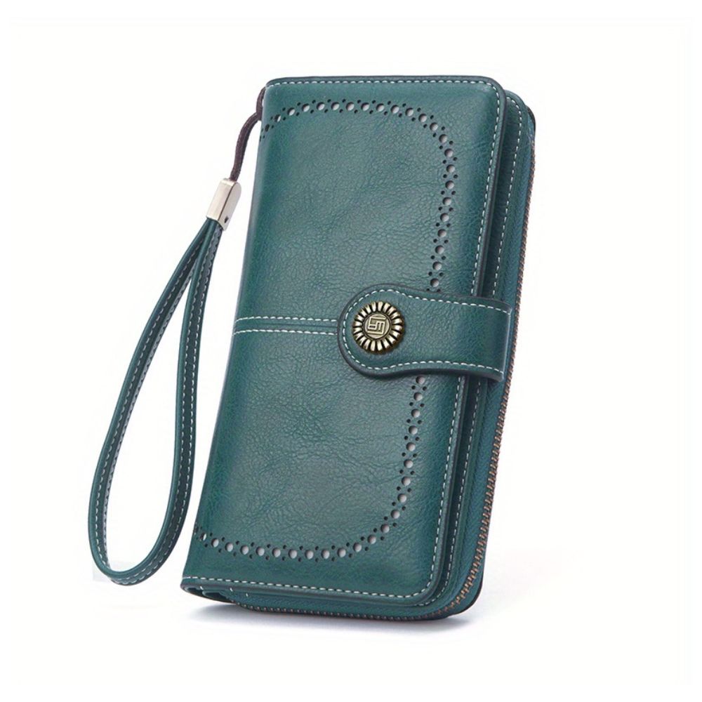 Portafoglio donna in pelle verde con cinturino da polso, chiusura a bottone decorativa, design elegante e spazioso, accessorio moda femminile.