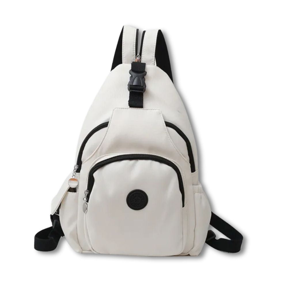 Zaino a tracolla bianco unisex, design moderno, tasche multiple, chiusura zip, ideale per scuola e viaggio. Accessorio moda versatile e pratico.