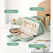 Custodia verde per gioielli con scomparti per orecchini, collane, anelli e gioielli. Design elegante, ideale per organizzare accessori.